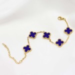 Złota bransoletka granatowe koniczynki stal chirurgiczna